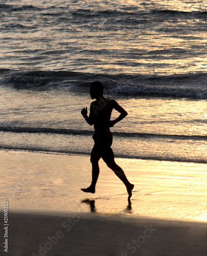 Man running on beach