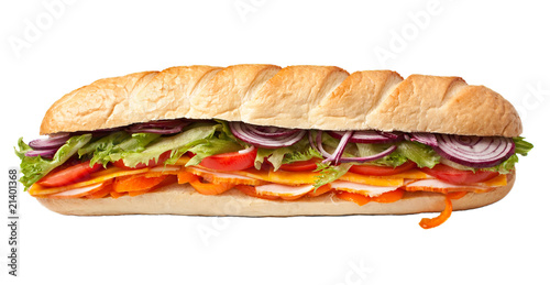 long baguette sandwich with lettuce, slices of fresh vegetables,