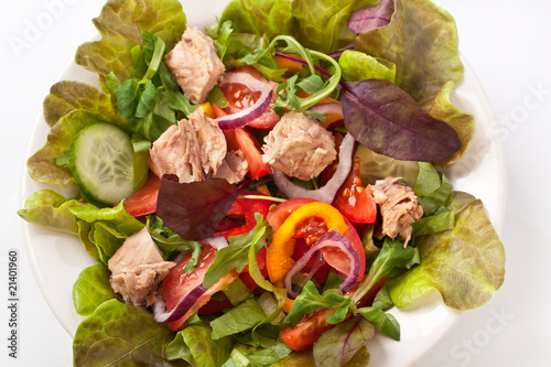 salad mix with tuna on a white bowl