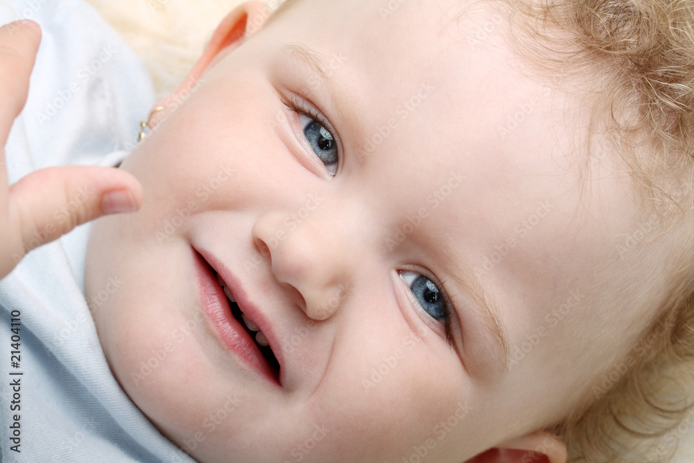 Baby looking at camera thinking about something Baby looking at camera thinking about something