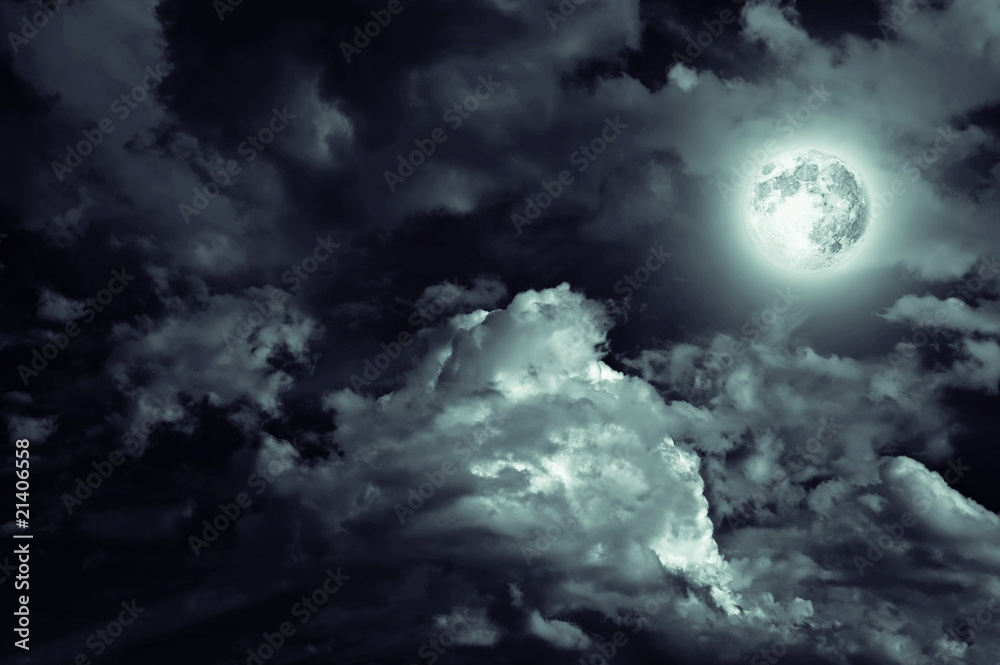 Naklejka premium magic moon over the clouds