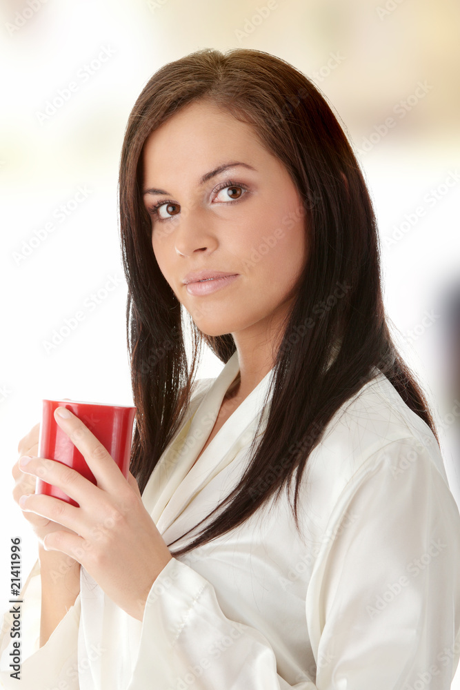 Young woman drinking morning coffee Young woman drinking morning coffee