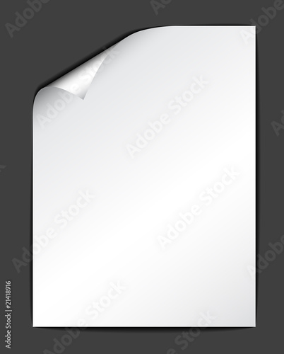 Sheet of white paper on dark background