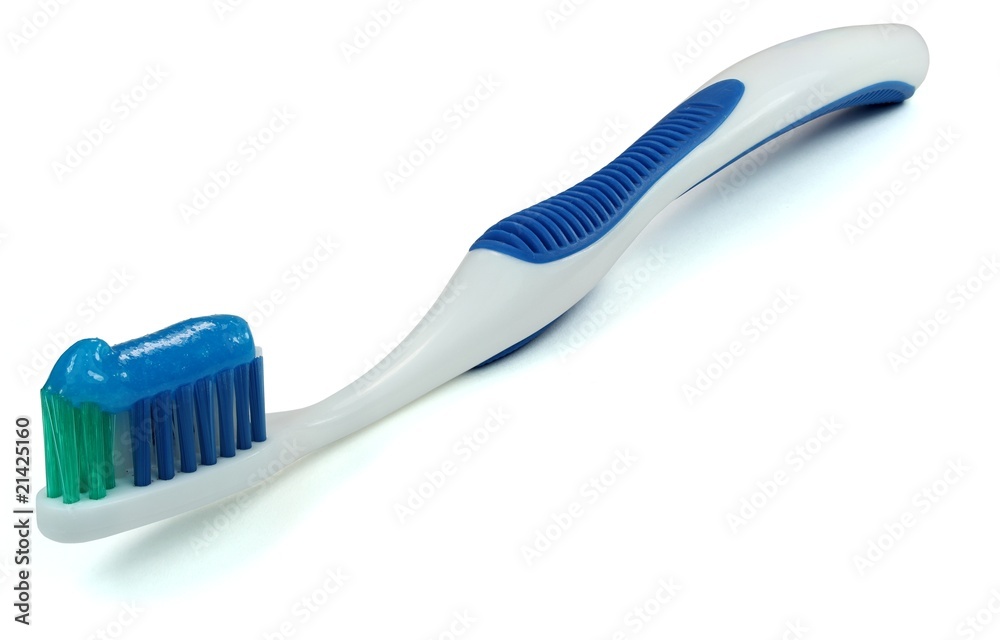 Blaue Zahnbürste mit Zahnpasta Blaue Zahnbürste mit Zahnpasta