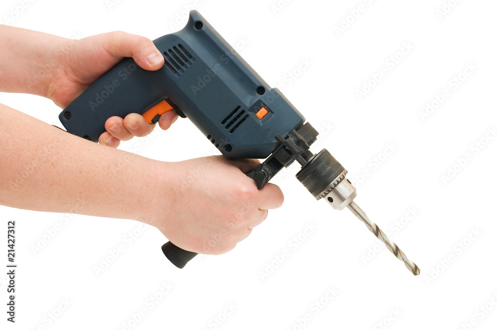 Drill in the hands isolated on white background Drill in the hands isolated on white background