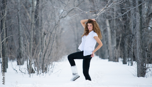 Fashion model in winter forest © zzzdim