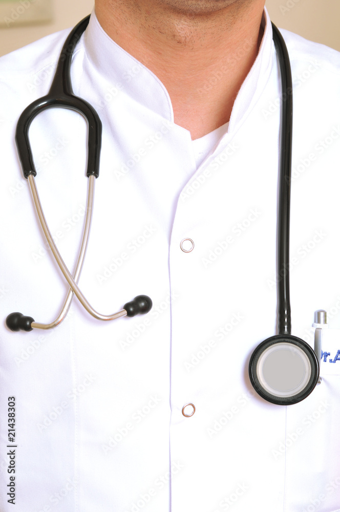 A vertical image of a doctor with stethoscope holding A vertical image of a doctor with stethoscope holding