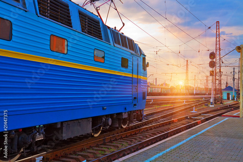 Sunset at the railway station photo