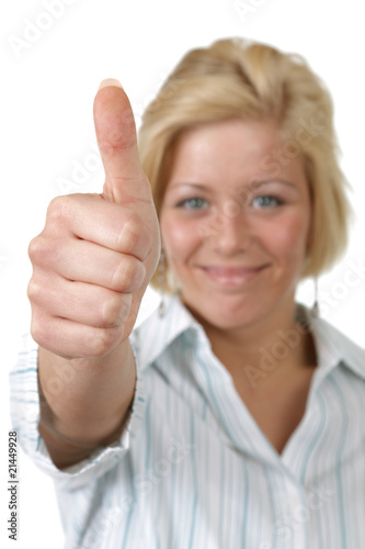 Young woman showing thumbs up