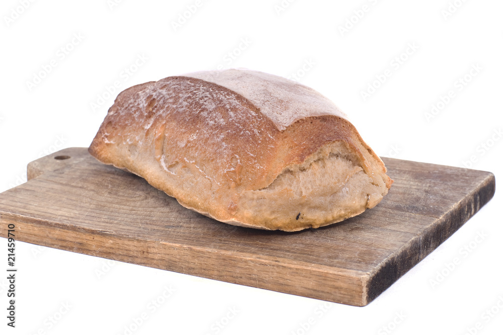 pain de campagne sur une planche à découper pain de campagne sur une planche à découper