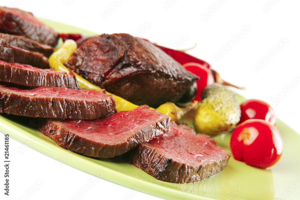 red beef slices on green dish
