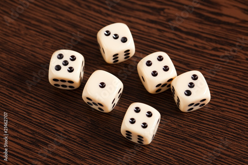 dice on wooden table
