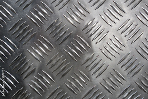 Detail of a new grid of steel placed along a road