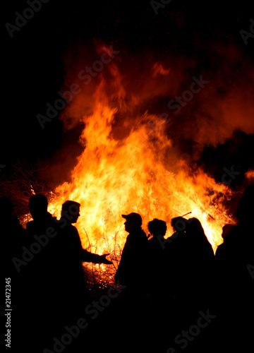 People at a bonfire