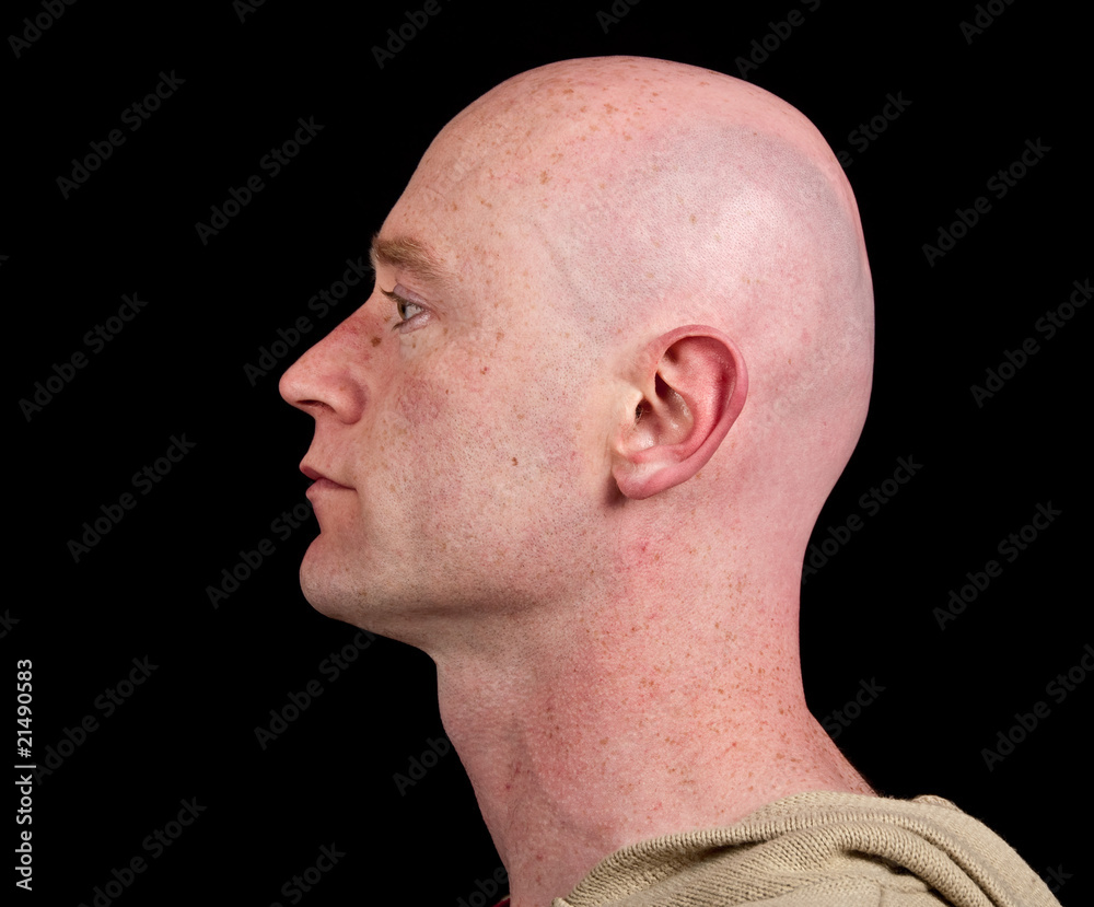 Naklejka premium close up picture of a male head from side on black