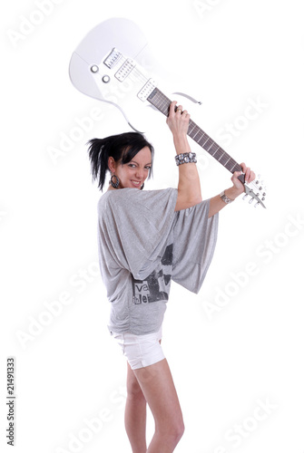 Pretty young women with guitar photo