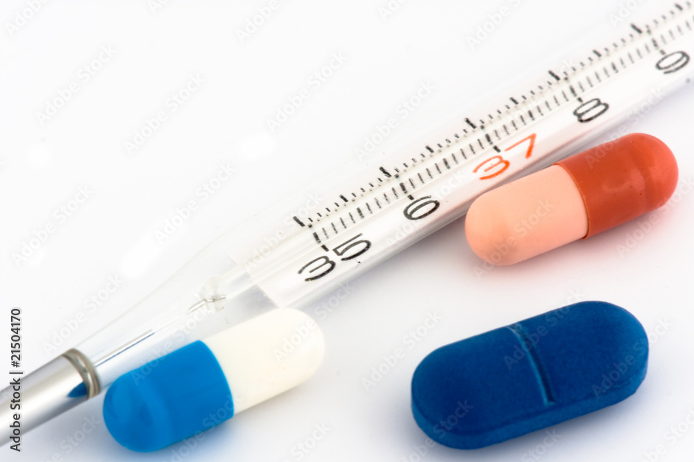 Pills and thermometer Pills and thermometer