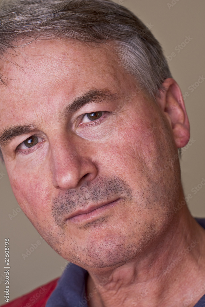 Pensive, attractive middle aged man with stubble Pensive, attractive middle aged man with stubble