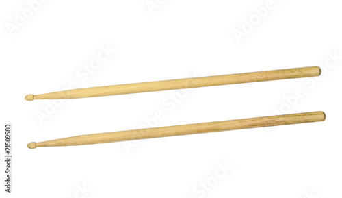 Two drumsticks over white with clipping path photo