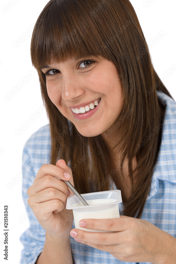 Female teenager eat healthy yogurt for breakfast Female teenager eat healthy yogurt for breakfast