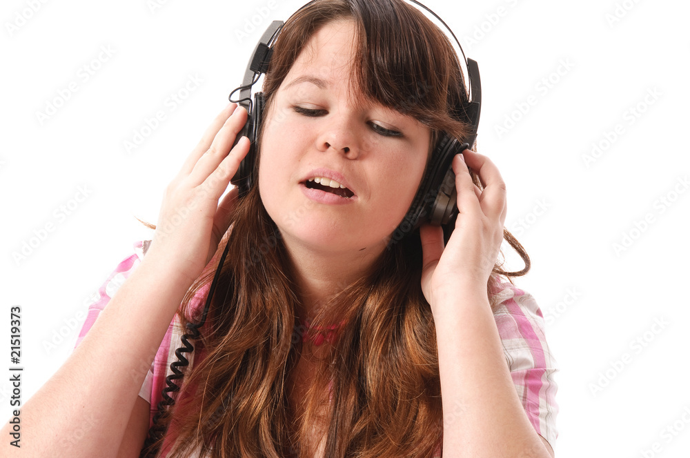 Teenager Mädchen hört Musik mit Kopfhörer Teenager Mädchen hört Musik mit Kopfhörer