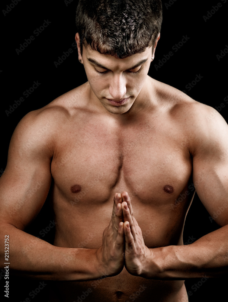 Fototapeta premium Muscular spiritual man doing yoga