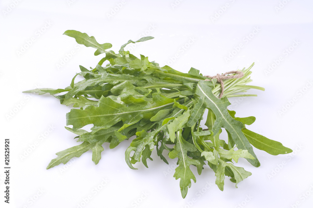 Rucola bunch isolated over white Rucola bunch isolated over white