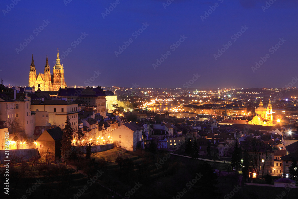 The panoramic View to bright Prague with colorful gothic Castle