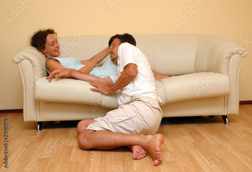 Man and woman on sofa