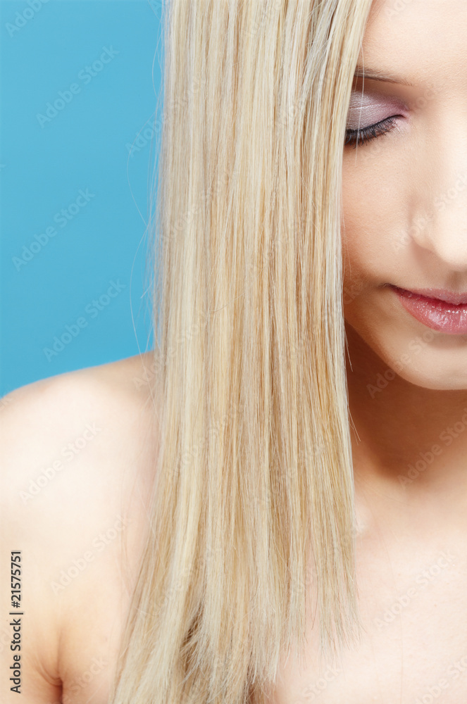 blonde girl's half-face portrait blonde girl's half-face portrait