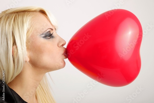 young woman with a heart-balloon photo