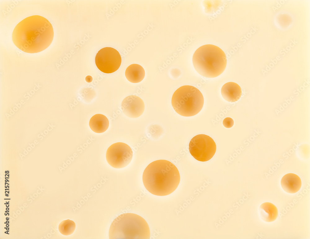Cheese background with heart shape holes Cheese background with heart shape holes