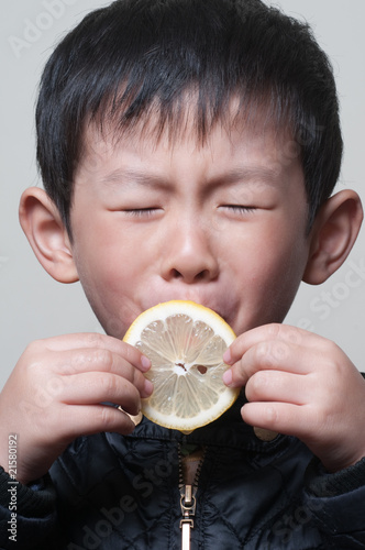 Eats the lemon boy