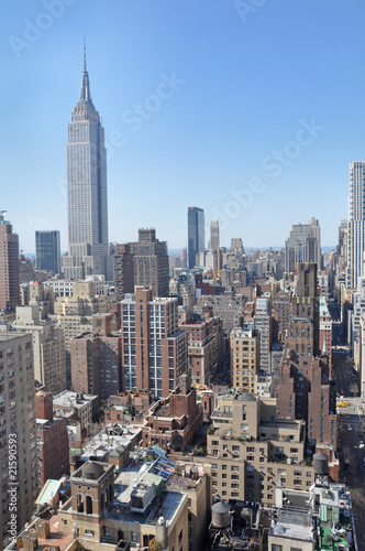 Empire State Building in mid-town Manhattan cityscape