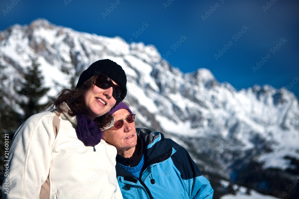 Senior and young woman in winterwonderland