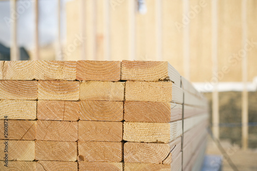 Close-up of Stacks of Lumber at a Construction Site photo