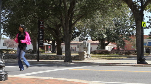 Woman Walking Across Street