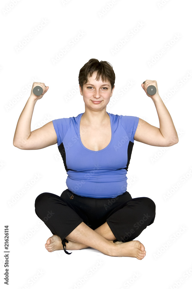 Young woman with dumbbells. Young woman with dumbbells.