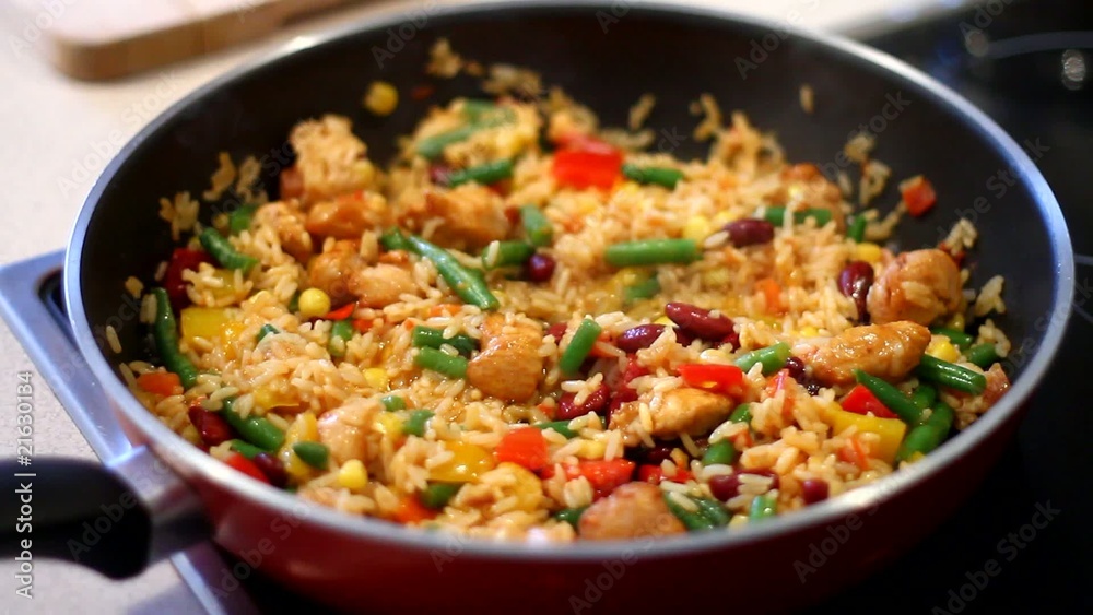 Cooking Mexican food on hot frying pan Cooking Mexican food on hot frying pan