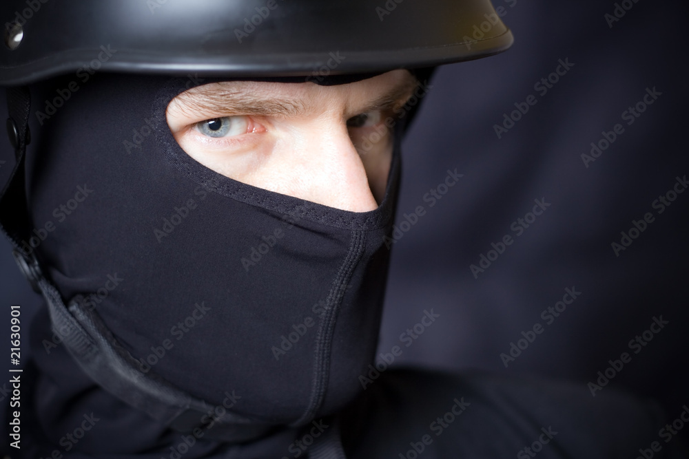 Man in helmet and mask staring at you Man in helmet and mask staring at you
