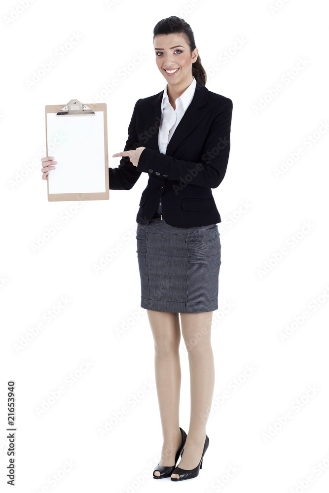 Full length of business woman pointing at the clipboard Full length of business woman pointing at the clipboard