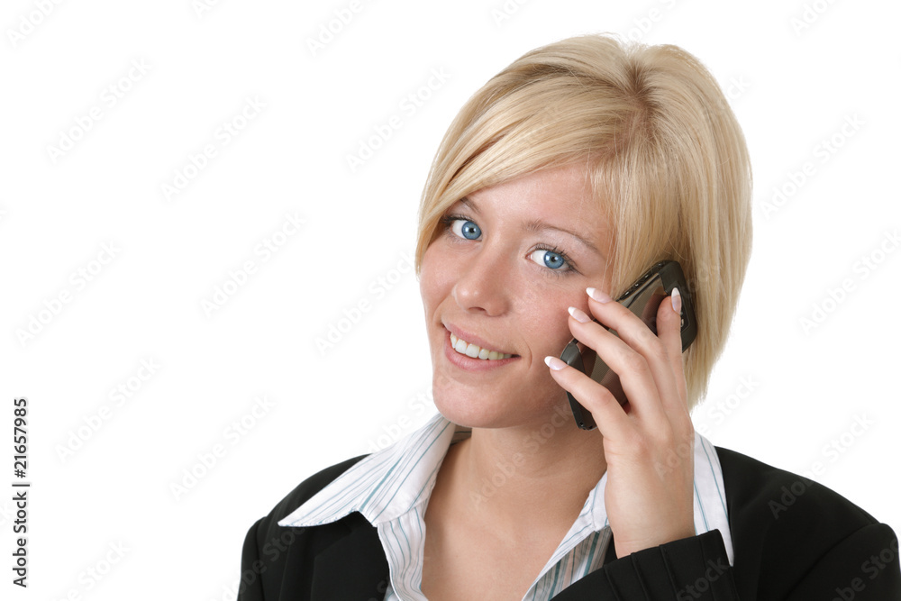 Young business woman talking on her mobile phone Young business woman talking on her mobile phone