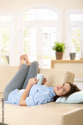 Woman relaxing on couch