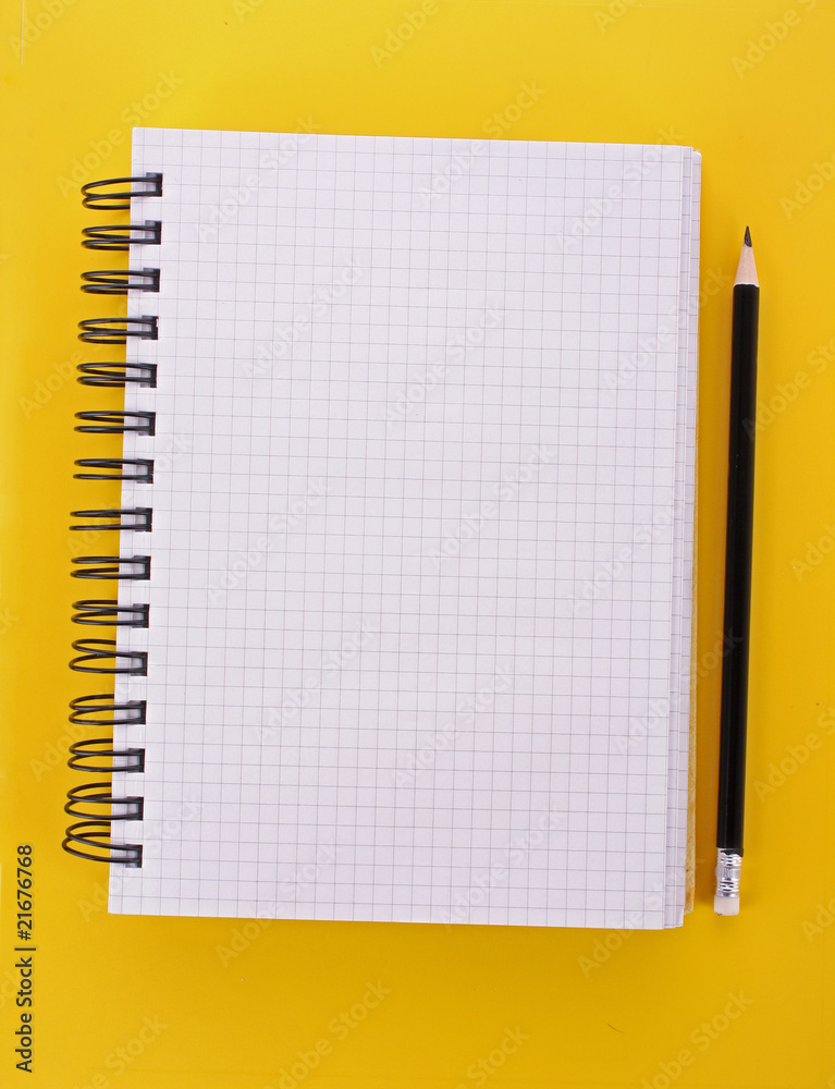 Notebook with pencil on the yellow background - obrazy, fototapety, plakaty 
