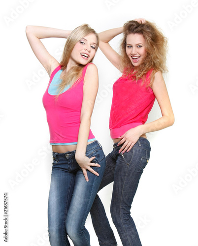 two young beautiful girls over white