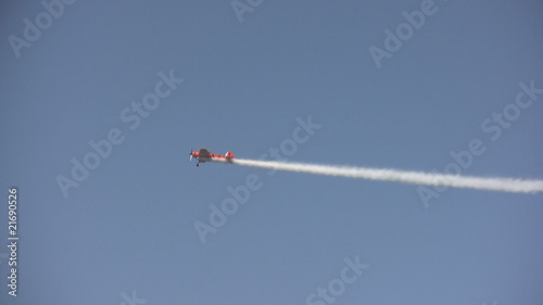Light sports airplane performing aerobatics