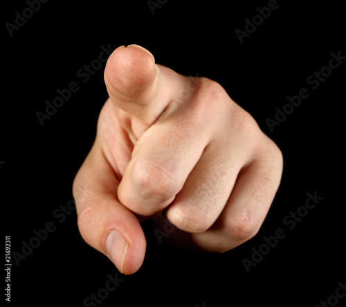 Index finger on black background