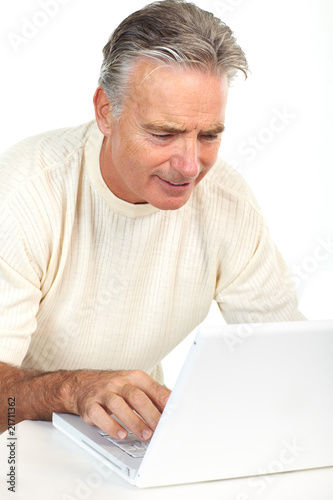 senior man with laptop