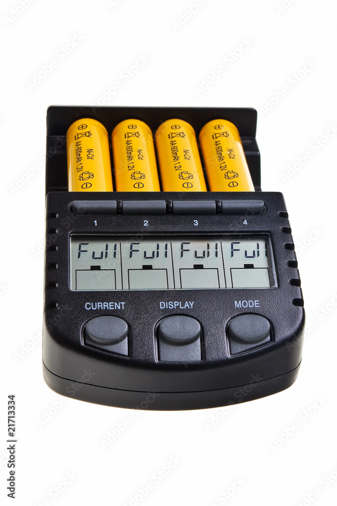 Accu charger in operation isolated over white background. Accu charger in operation isolated over white background.