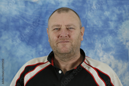 baldy beardy middle-aged man posing